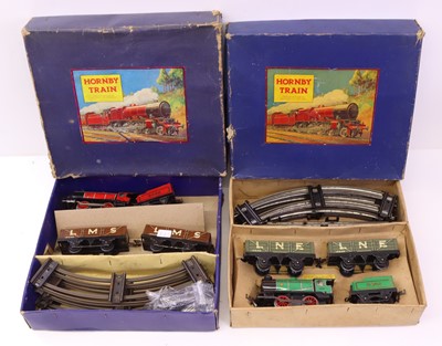 Lot 352 - 2 Hornby O gauge M1 Goods tinplate sets, the...