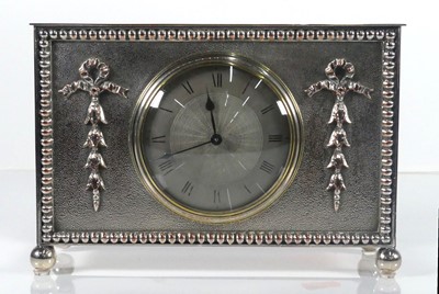 Lot 22 - An early 20th century silver plated mantel...