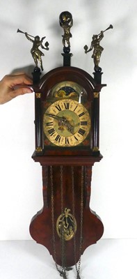Lot 299 - A reproduction Dutch figured walnut wall clock,...