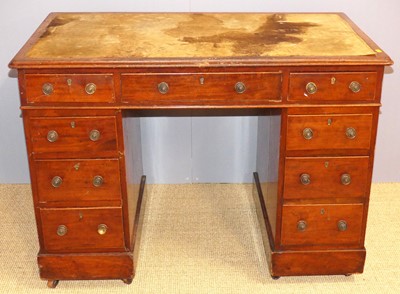Lot 650 - A mid-Victorian mahogany and leather inset...
