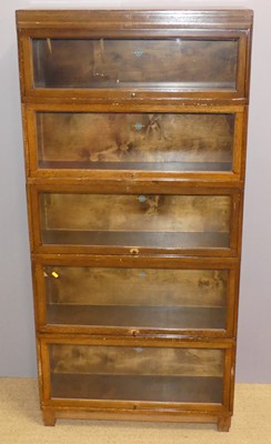Lot 668 - A 1930's Globe Wernicke oak five-tier stacking...