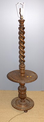 Lot 659 - A stained beech and walnut spiral turned...
