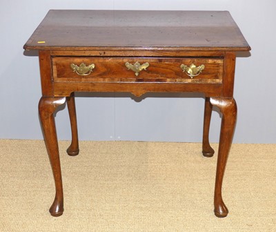 Lot 658 - A George III oak and mahogany crosbanded low...
