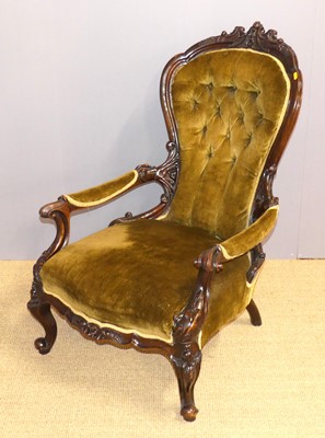 Lot 697 - A mid-Victorian floral carved walnut and...