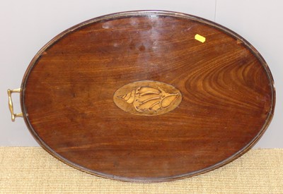 Lot 682 - An Edwardian mahogany oval tray, with conch...