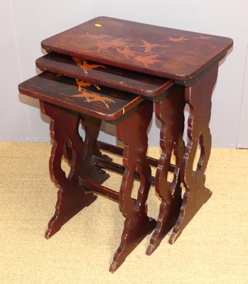 Lot 660 - A Japanese lacquered nest of three occasional...