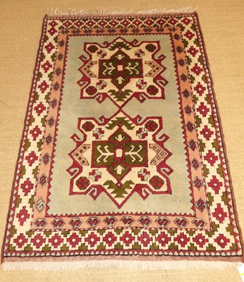 Lot 746 - A Turkish woollen Kazak rug, the two central...