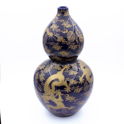 Lot 6 - A reproduction Chinese porcelain double gourd...