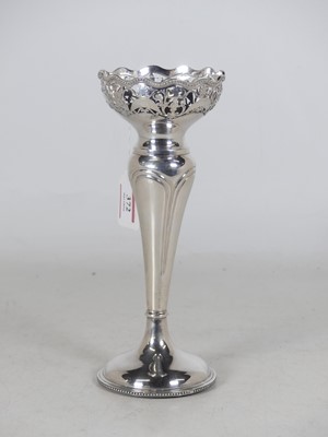 Lot 372 - An Edwardian silver spill vase, having a...