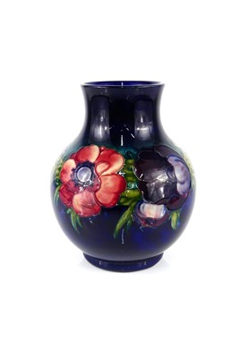 Lot 214 - A Moorcroft Anemone pattern pottery vase, of...