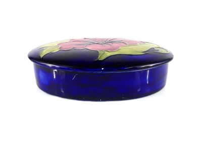 Lot 165 - A Moorcroft Hibiscus pattern pottery oval...