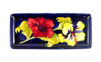 Lot 221 - A Moorcroft Hibiscus pattern pottery...
