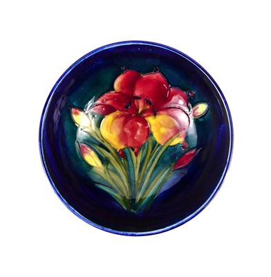 Lot 173 - A Moorcroft Columbine pattern pottery footed...