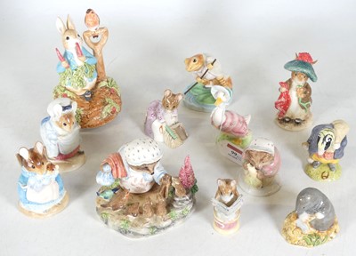 Lot 99 - A collection of Beatrix Potter figures, to...