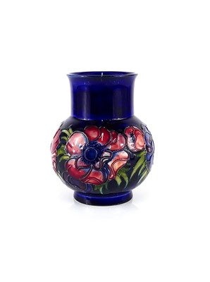 Lot 216 - A Moorcroft Anemone pattern pottery vase, the...