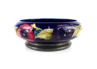 Lot 224 - A Moorcroft Liberty & Co Pansy pattern pottery...