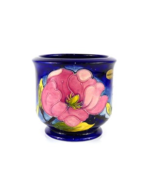Lot 226 - A Moorcroft Pink Magnolia pattern pottery...
