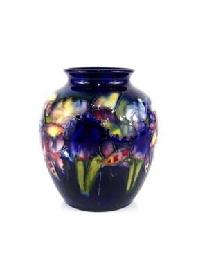 Lot 192 - A Moorcroft Orchid pattern pottery vase, of...