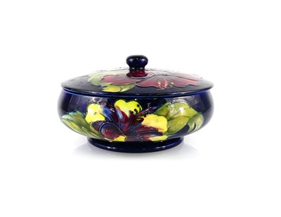 Lot 183 - A Moorcroft Hibiscus pattern pottery squat...