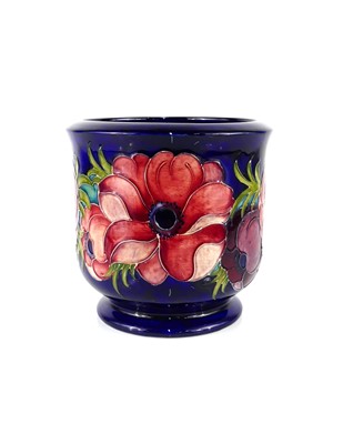 Lot 208 - A Moorcroft Anemone pattern pottery footed...