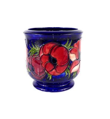 Lot 207 - A Moorcroft Anemone pattern pottery footed...