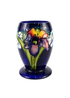 Lot 197 - A Moorcroft Orchid pattern pottery footed vase,...
