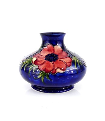 Lot 212 - A Moorcroft Anemone pattern pottery squat vase,...