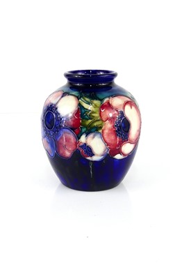 Lot 229 - A small Moorcroft Anemone pattern pottery vase,...