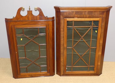 Lot 707 - An early 19th century mahogany single door...