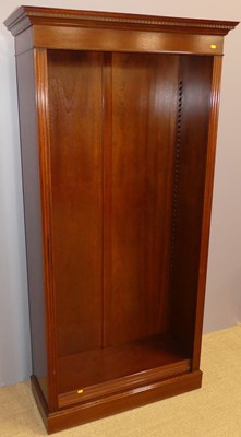 Lot 734 - A contemporary mahogany free standing bookcase,...