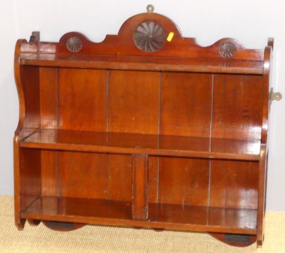 Lot 605 - A late Victorian mahogany hanging wall shelf,...