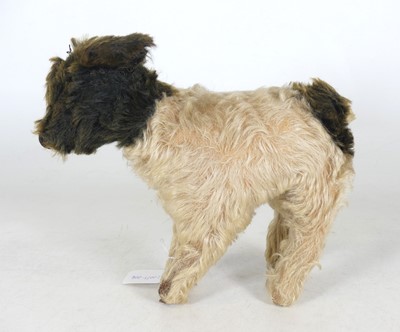 Lot 91 - An early 20th century mohair toy dog, modelled...