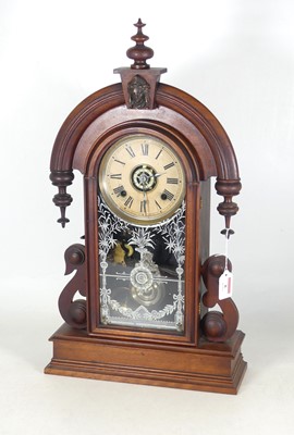 Lot 8 - A late 19th century American walnut mantel...