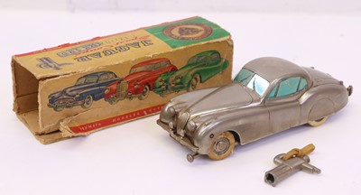 Lot 437 - Prameta clockwork diecast Jaguar XK120 in...