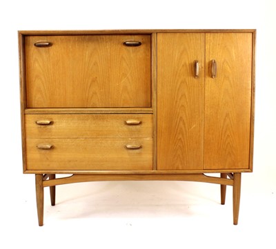 Lot 387 - A 1960s G-Plan 'Fresco' teak compact highboard,...