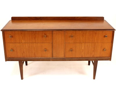 Lot 384 - A 1960s Homeworthy teak compact ledgeback...