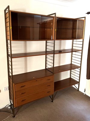 Lot 393 - A 1970s Ladderax teak and painted metal...