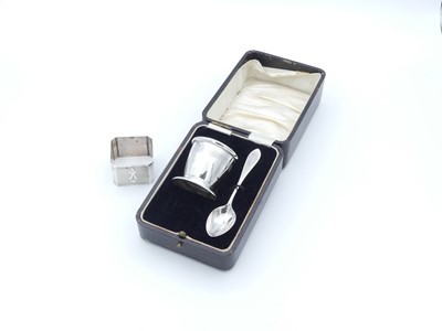 Lot 247 - A cased silver egg-cup and spoon set, each...