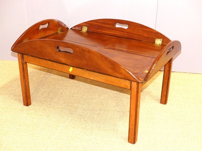Lot 678 - A contemporary mahogany butler's table on...