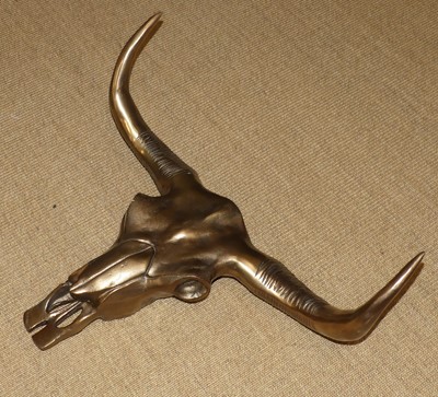 Lot 684 - A contemporary metallic bull skull, with...