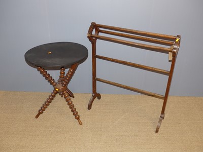 Lot 672 - A circa 1900 Gypsy table, raised on bobbin...