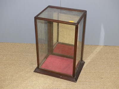 Lot 637 - A circa 1900 mahogany and glazed table top...