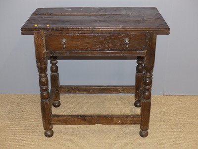 Lot 700 - An 18th century provincial oak single drawer...