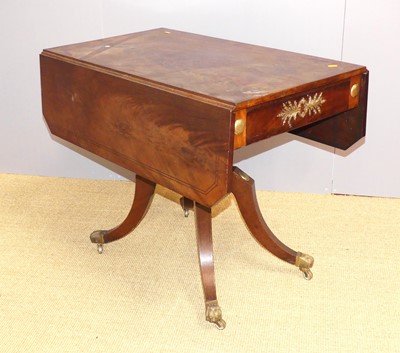 Lot 702 - A Regency flame mahogany and gilt brass...