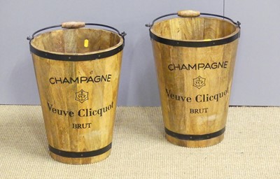 Lot 722 - A pair of modern wood and metal bound...