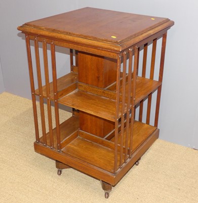 Lot 709 - A circa 1900 mahogany square revolving...