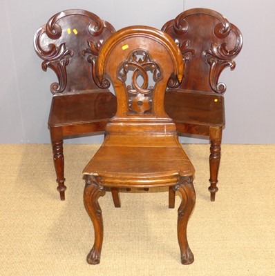 Lot 690 - A pair of mid-Victorian mahogany panel seat...