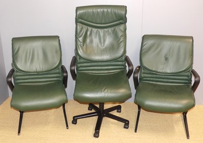Lot 688 - A pair of contemporary green leather swivel...