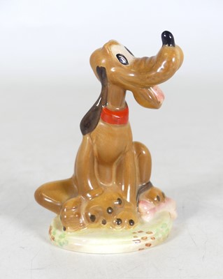Lot 97 - A Beswick Walt Disney figure 'Pluto', gold...