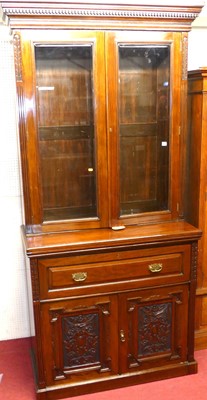 Lot 610 - A late Victorian walnut secretaire bookcase,...